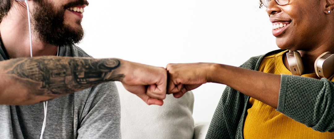 Therapist and patient doing a fist bump